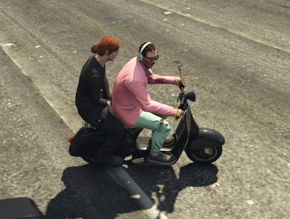 GTA V Online: two characters riding a black scooter down the road
